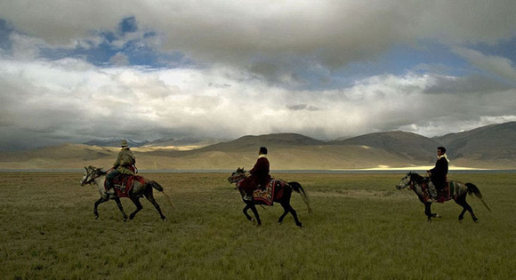 Three horsemen on the banks of Tso Moriri at nearly 16000 ft