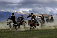A group of Changpa horsemen riding a race near lake Tso Moriri. The races are infrequent.