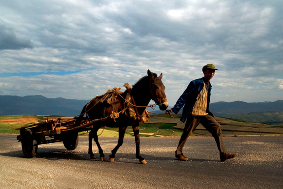 5. A Dongchuan peasant returns home with his horse