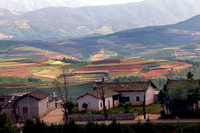 11. The small hamlets that dot the Dongchuan landscape seamlessly merge into the colours